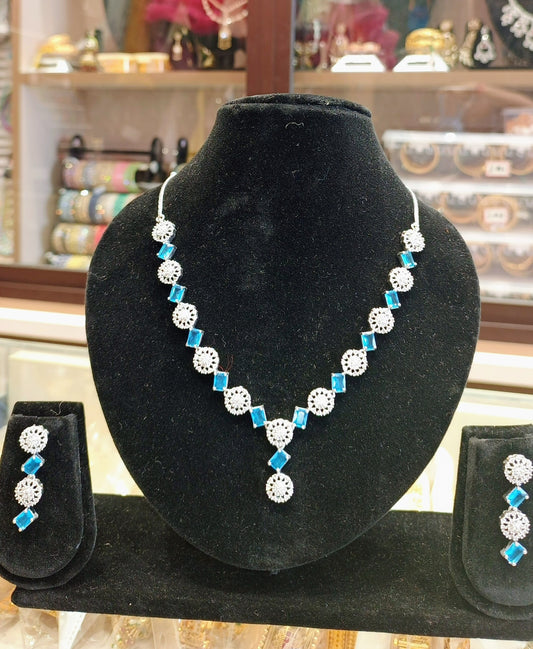 Blue stone American diamond necklace set with earrings silver look party wear jewellery for women India